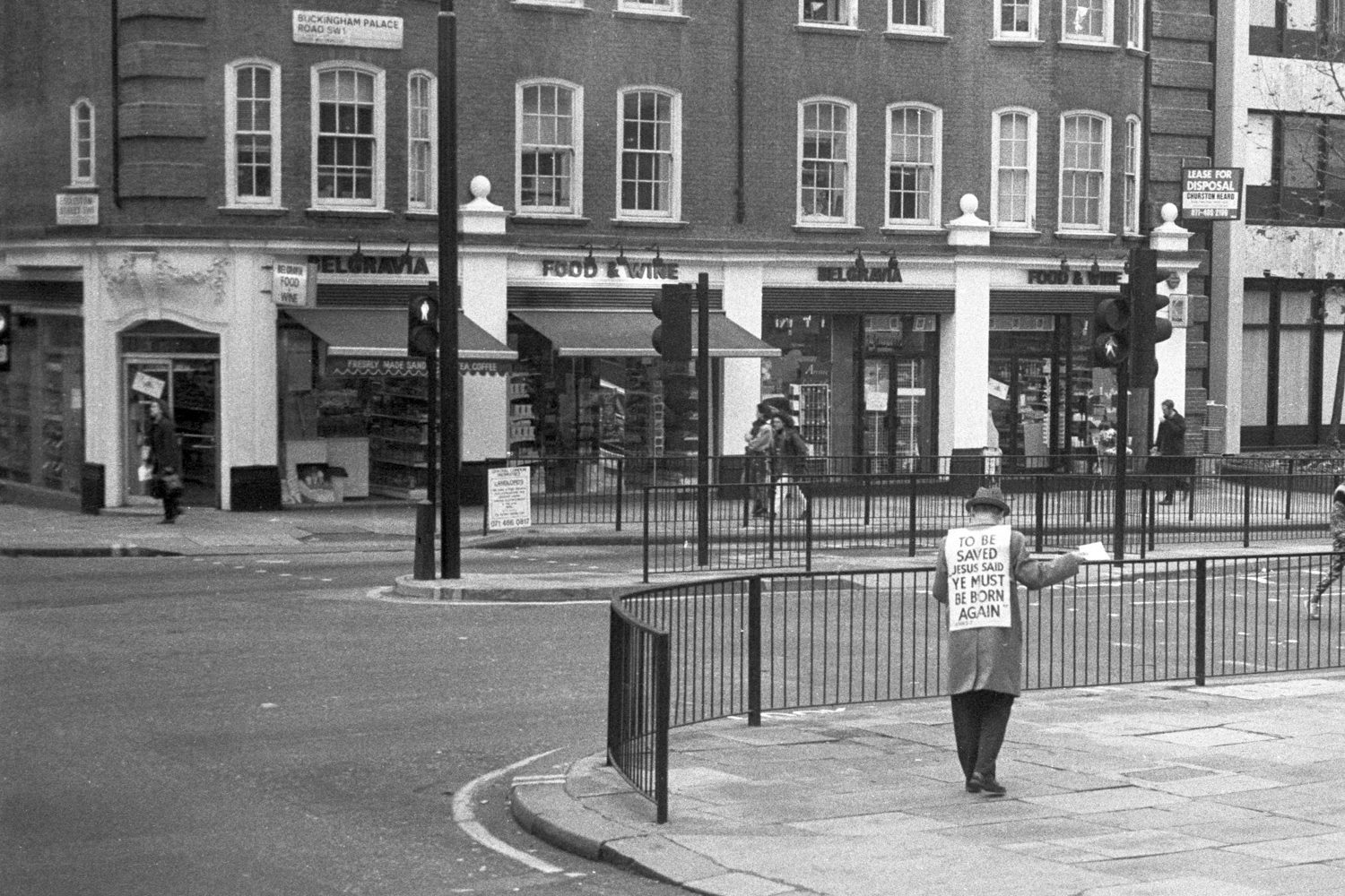 London 1991 Buckingham Palace Road man with Christian literature