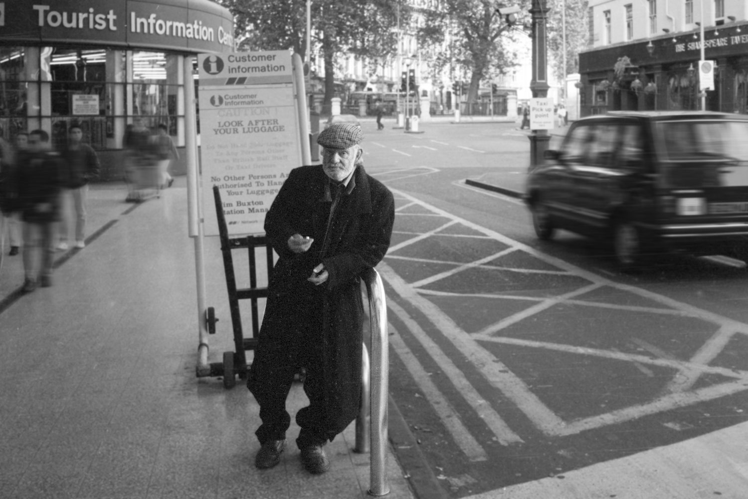 Victoria Station London 1989. Homeless man.